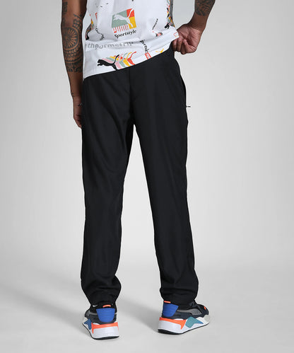 68704801 ESS Zippered Woven Pants op PUMA Black