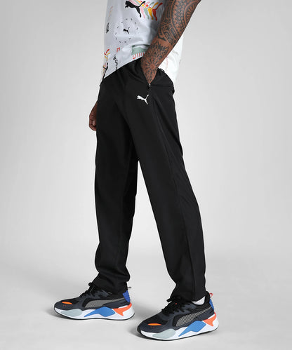 68704801 ESS Zippered Woven Pants op PUMA Black