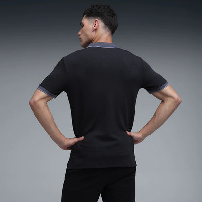 63657801 WARDROBE ESS Interlock Polo PUMA Black